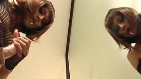 Redhead Ladyboy In black lingerie Sucks A sex tool By The Mirror